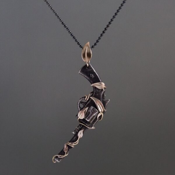 relic-pistol-pendant-silver-gold-juju-gems-jewellery