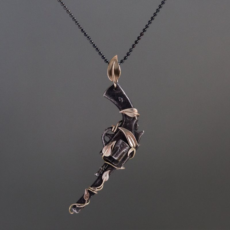 relic-pistol-pendant-silver-gold-juju-gems-jewellery