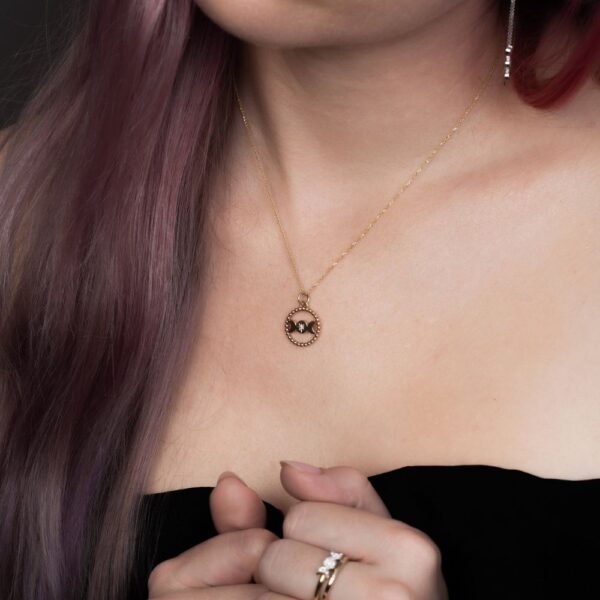goddess pendant in yellow gold set with diamond