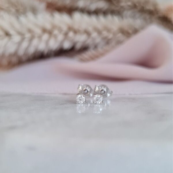 mini white gold and diamond stud earrings