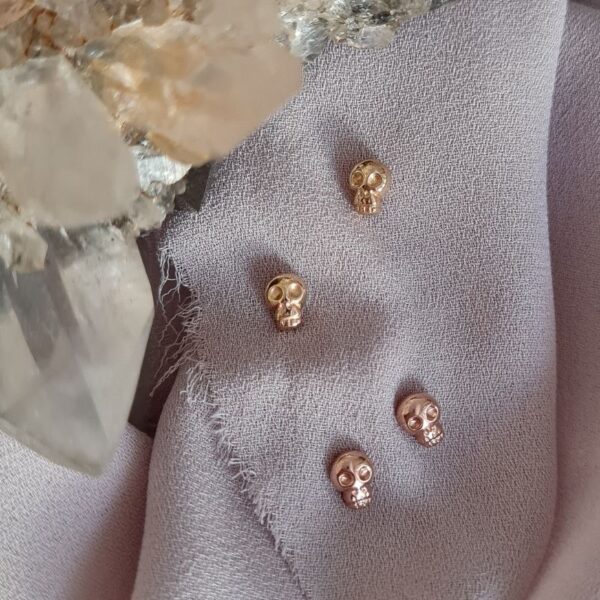Tiny skull stud earrings