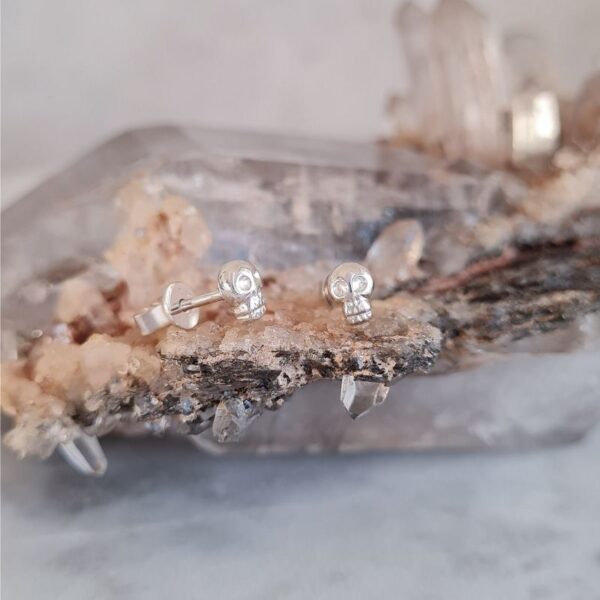 Tiny skull stud earrings silver