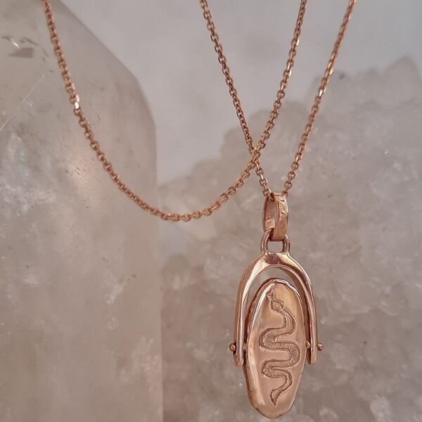 snake spinner pendant