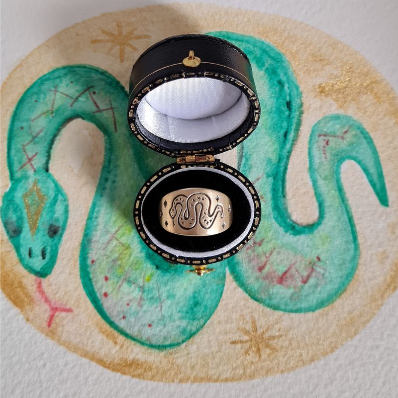 Snake art ring yellow gold