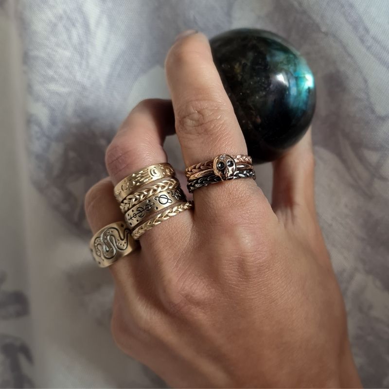juju gems rings on hand in group shot