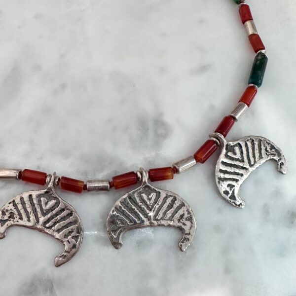Lunula necklace with silver amulets and agate beads