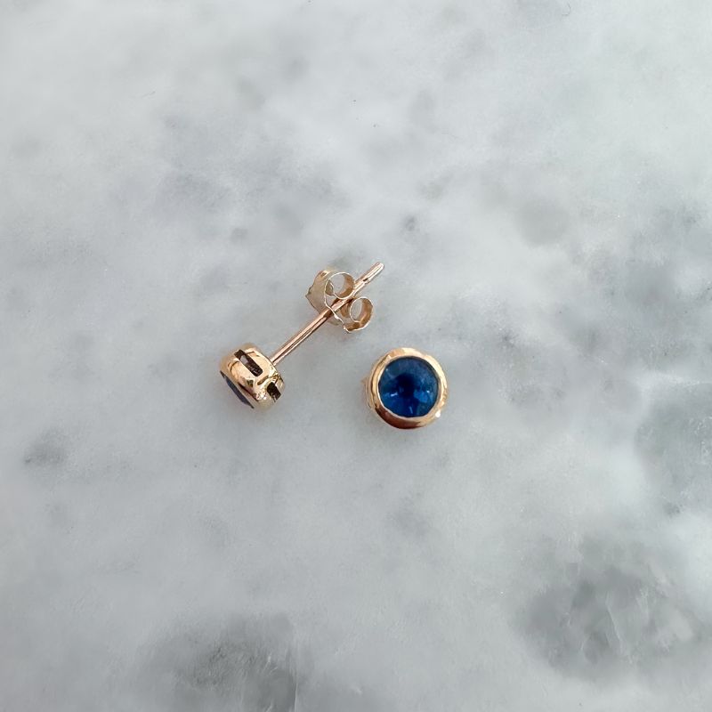 round sapphire bezel set stud earrings