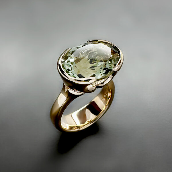 yellow gold lakshmi ring featuring green quartz gemstone