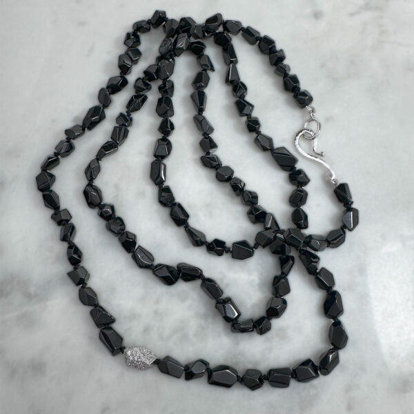 juju gems jewellery black spinel bead necklace with a feature 18ct white gold diamond set bead