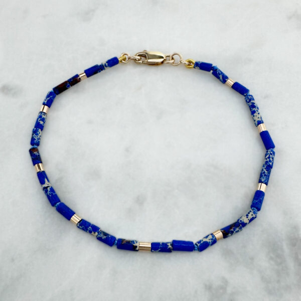 juju gems jewellery artefact bracelet featuring blue imperial jasper and yellow gold