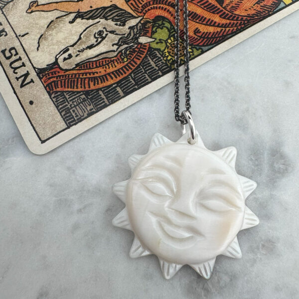juju gems jewellery sol pendant made from mother of pearl with a blackened silver chain