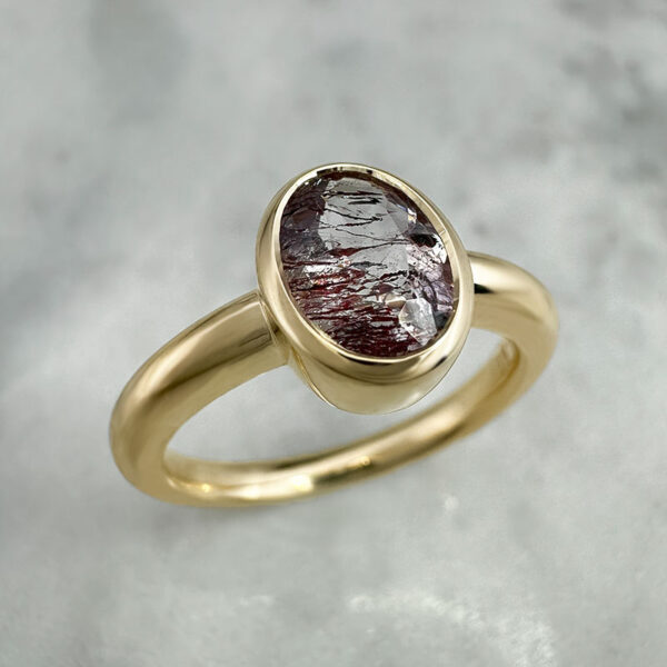unique gemstone ring in yellow gold